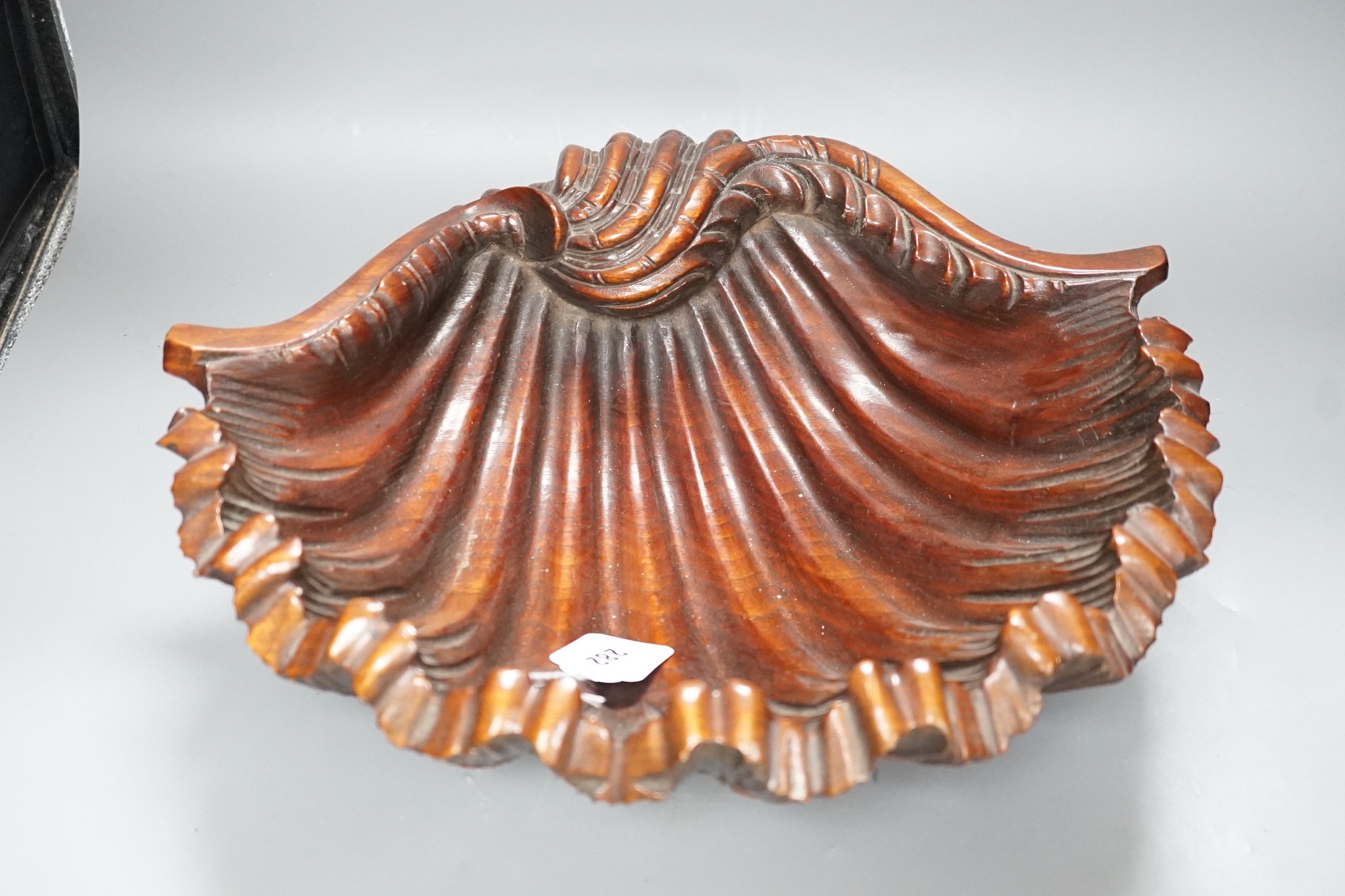 A large 20th century carved walnut scallop shell dish, 41.5cm wide